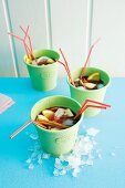 Sangria in cups with straws