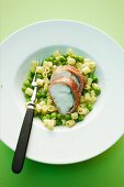 Monkfish saltimbocca with macaroni and peas