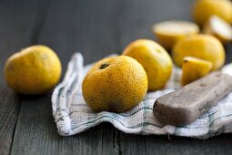 Yuzu fruits on a tea towel