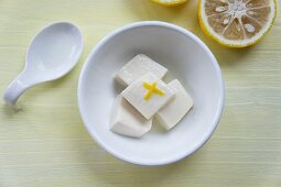 A bowl of tofu with yuzu juice and zest