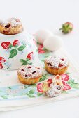 Strawberry muffins dusted with icing sugar