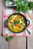 Potato soup with carrots and beef