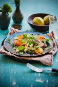 Water cress salad with vegetables and citrus fruits