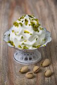 Frozen yogurt with chopped pistachios