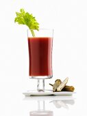 A glass of tomato and vegetable juice