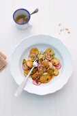 Fried potato salad with radishes and cress
