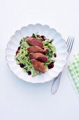 Hare fillet on a bed of creamy savoy cabbage