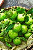 Milk fruits with leaves at a market in Vietnam