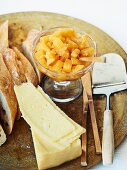 Sweet pineapple and onion chutney, bread and cheese