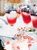 Rice dessert with strawberry jelly and blueberries for Christmas