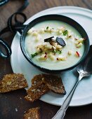 potato soup with apple and black truffles for New Year's Eve