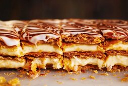 Mille feuilles with light cream and a light and dark chocolate glaze