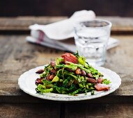 Savoy cabbage salad with sausage and almonds