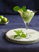 Frozen lime margarita with mint and a kaffir lime leaf