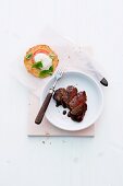Steak with balsamic cream and potato cakes