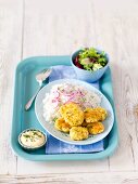 Egg patties with rice and red onions
