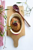 Duck in a gingerbread sauce with cranberries