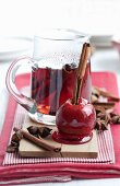 Christmas mulled wine with a spiced toffee apple