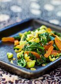 Warm spinach salad with dried apricots