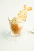 Mocha granita with vanilla ice cream and an orange wafer