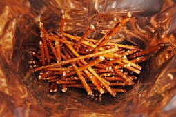 A bag of pretzel sticks (seen from above)