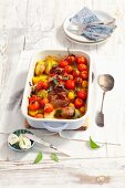 Pork fillet with potatoes, cherry tomatoes and sage butter