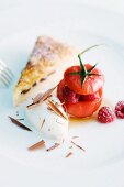 Tomatoes filled with raspberries, caramelised Eierschecke (speciality layer cake from Saxony and Thuringia) and white chocolate ice cream