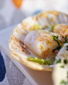 Scallops wrapped in bread with chervil