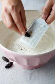 Redcurrant terrine being made: tonka beans being grated