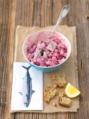 Herring salad with beetroot, onions apple and mayonnaise