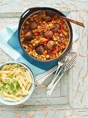 Mexican meatballs served with penne pasta