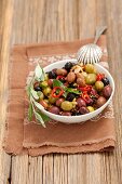 Mixed marinated olives with garlic, , mustard and chilli