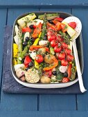 Roasted vegetables: potatoes, tomatoes, courgettes and asparagus