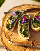 Bread with sorrel pesto and violets