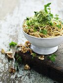 Spaghetti with a herb and walnut pesto