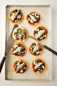 Mini pizzas with sardines