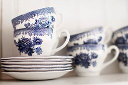 White tea service with blue painted pattern