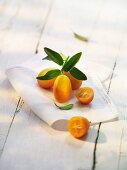 Kumquats on a cloth