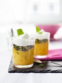 Mango purée with roasted pistachios and vanilla cream
