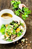 A wild herb salad with chickweed, bean sprouts and vinaigrette