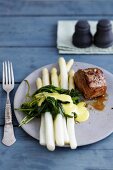 Veal fillet with white asparagus and woodruff-Hollandaise sauce