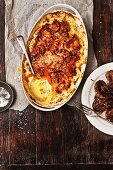 Sweet potato gratin and herb lamb chops