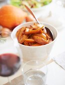 Sweet potato wedges on a table laid for Thanksgiving