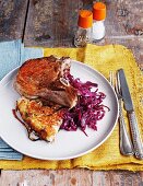 Pork chops with potato cake and red cabbage