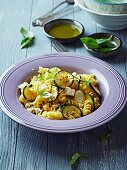 Fusilli salad with courgette, goat's cheese and lemon zest