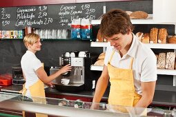 Two employees working in a bakery