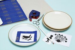 Instructions and craft materials for painting plates