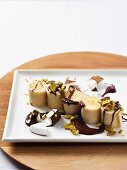 Coconut and vanilla wraps with chocolate, bananas and nuts