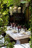 Garden table with place settings