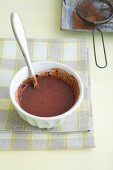 Cocoa mixed with cornflour, sugar and milk to make chocolate pudding